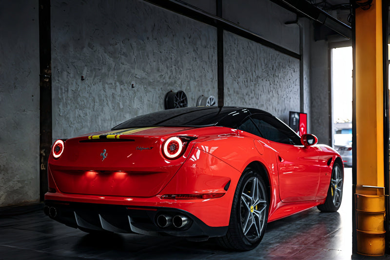 Ferrari Red Color PPF on a small coupe used to illustrate vehicle-based roll-size planning