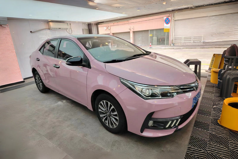 Pink NEOPPF Color PPF vehicle view in mixed workshop and outdoor light