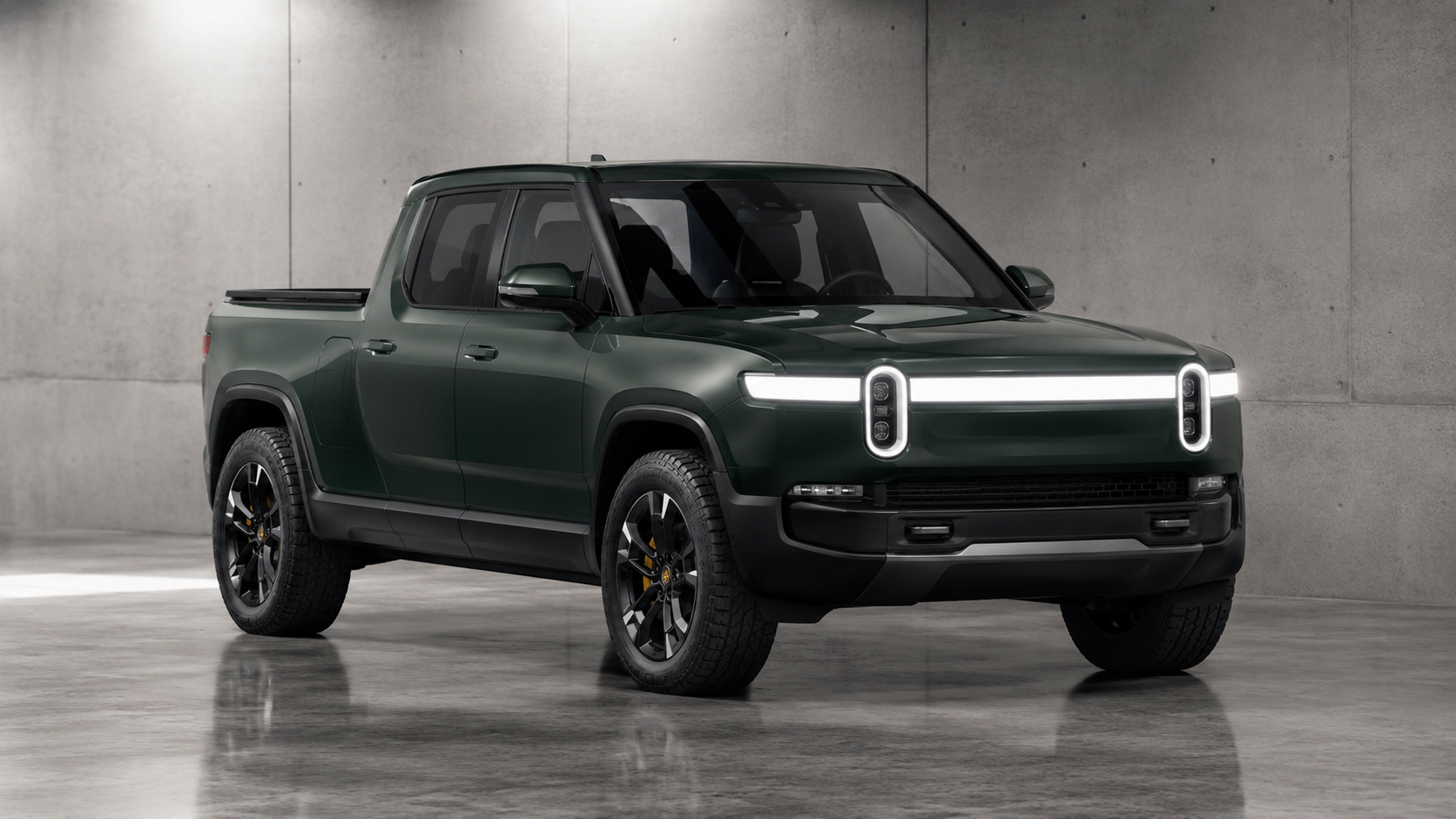 Rivian R1T in forest green colored paint protection film — Rivian PPF soft paint guide 2026