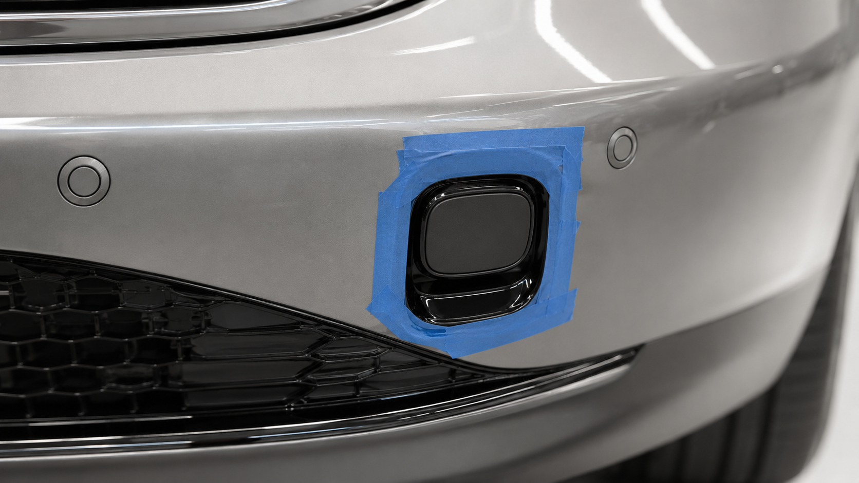 Car bumper sensors masked before PPF application — PPF sensors and ADAS brand reference 2026