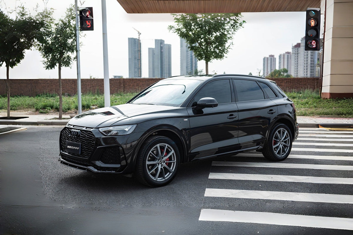 NEOPPF Metallic Black SUV in a full side view used as a named-product record example