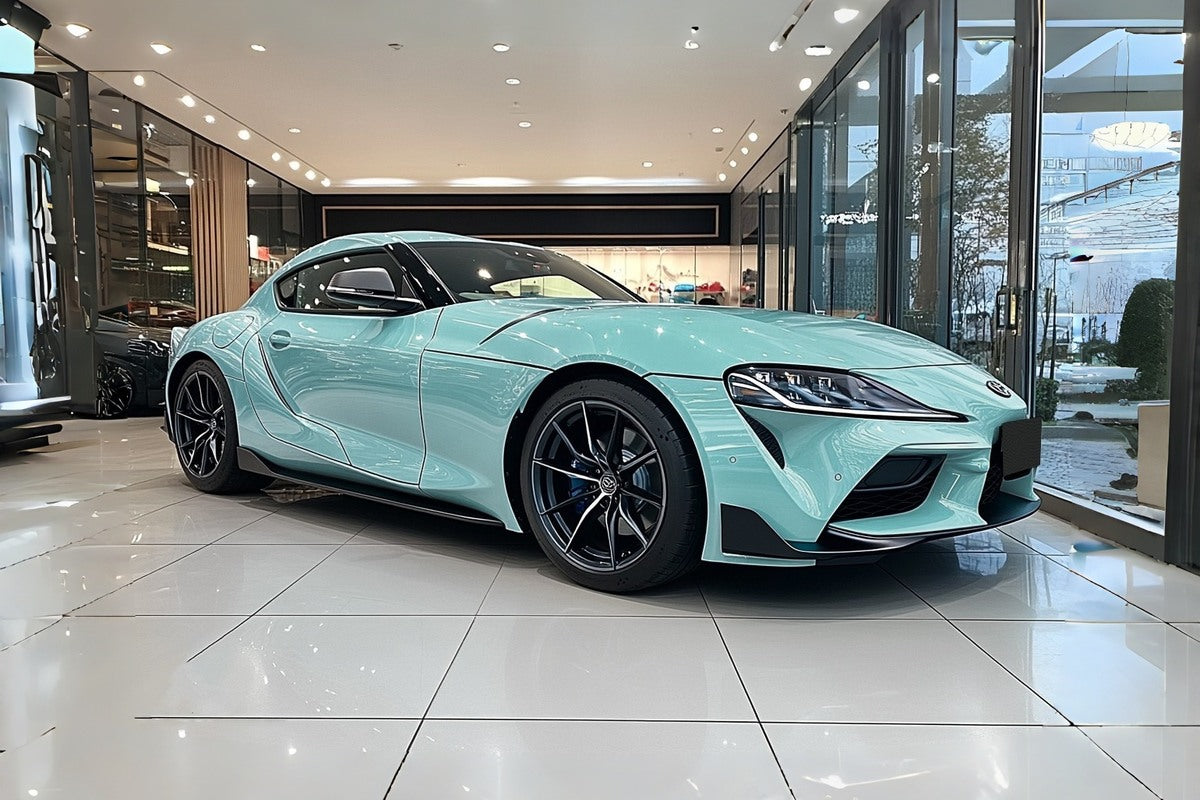 Cold Crystal Light Blue color PPF vehicle displayed under indoor showroom lighting