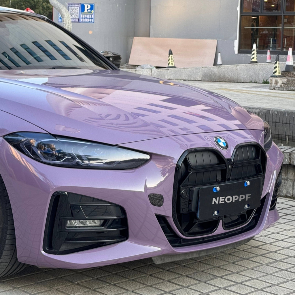 A sports car with Provence Purple paint protection film colored wrap is parking in the garage