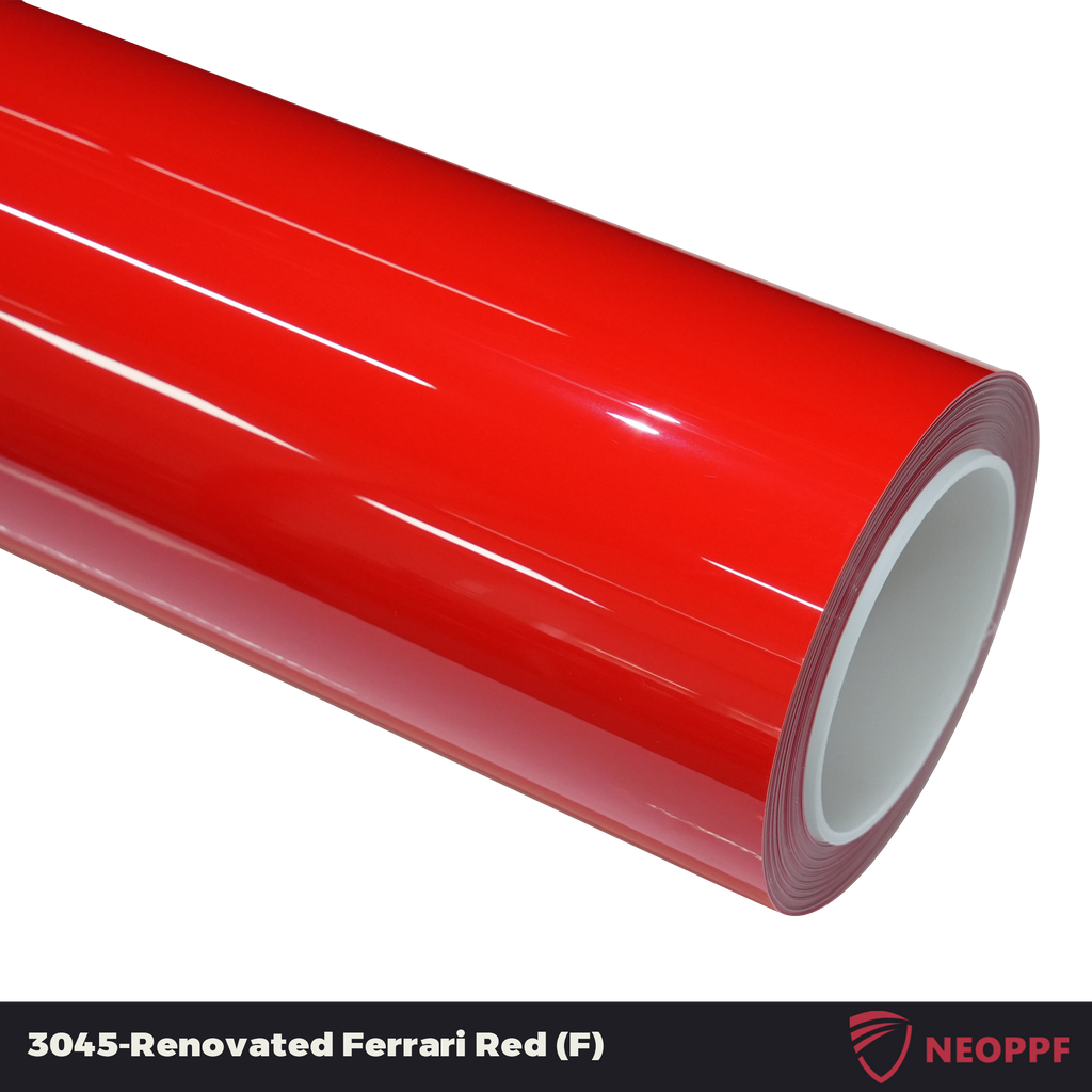 A sports car with Renovated Ferrari Red paint protection film colored wrap is parking in the garage