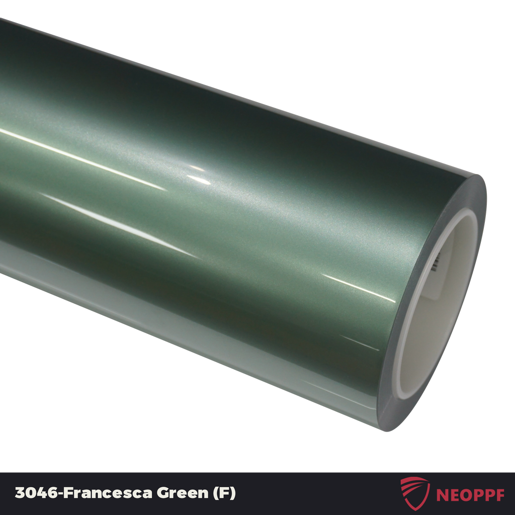 A sports car with Francesca Green paint protection film colored wrap is parking in the garage