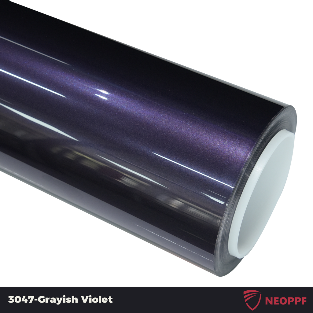 A sports car with Grayish Violet paint protection film colored wrap is parking in the garage