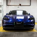 A sports car with Gentian Blue paint protection film colored wrap is parking in the garage