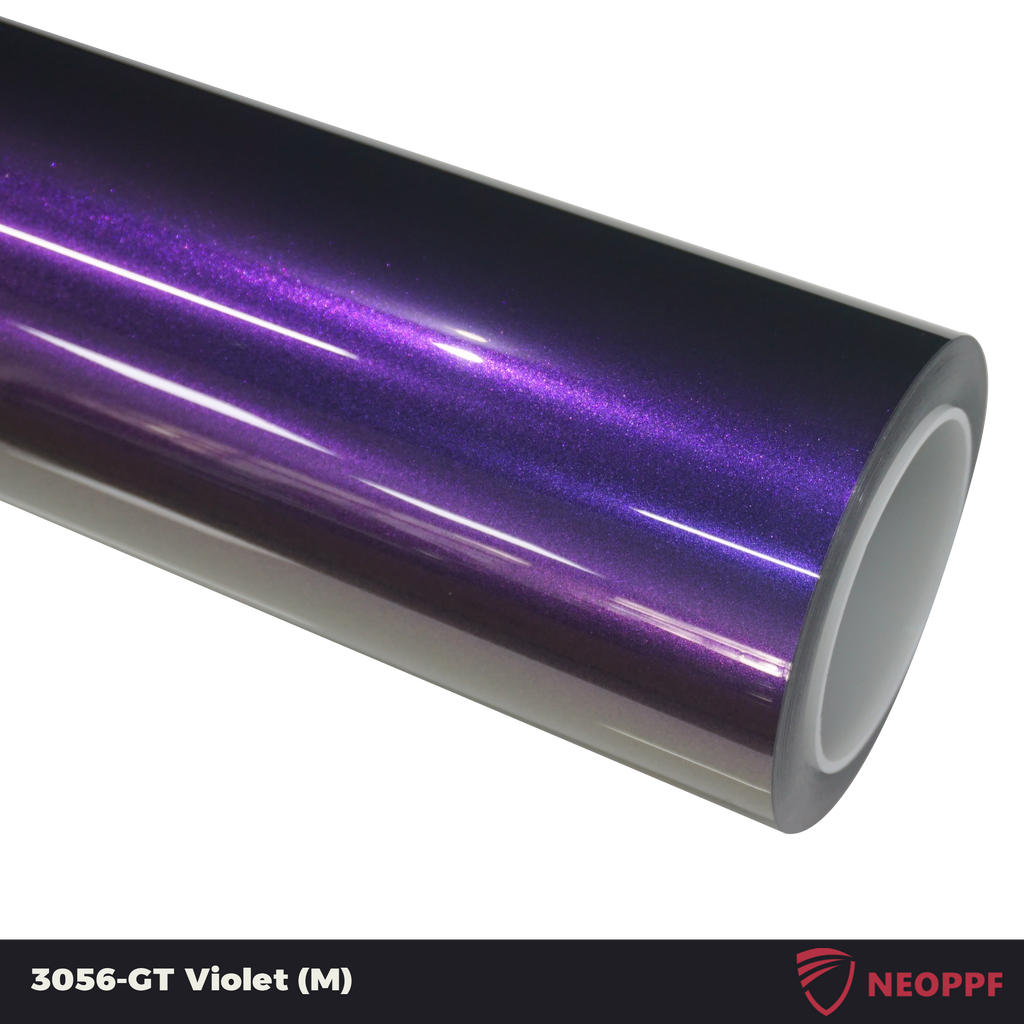 A sports car with GT Violet paint protection film colored wrap is parking in the garage
