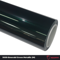 A sports car with Emerald Green Metallic paint protection film colored wrap is parking in the garage