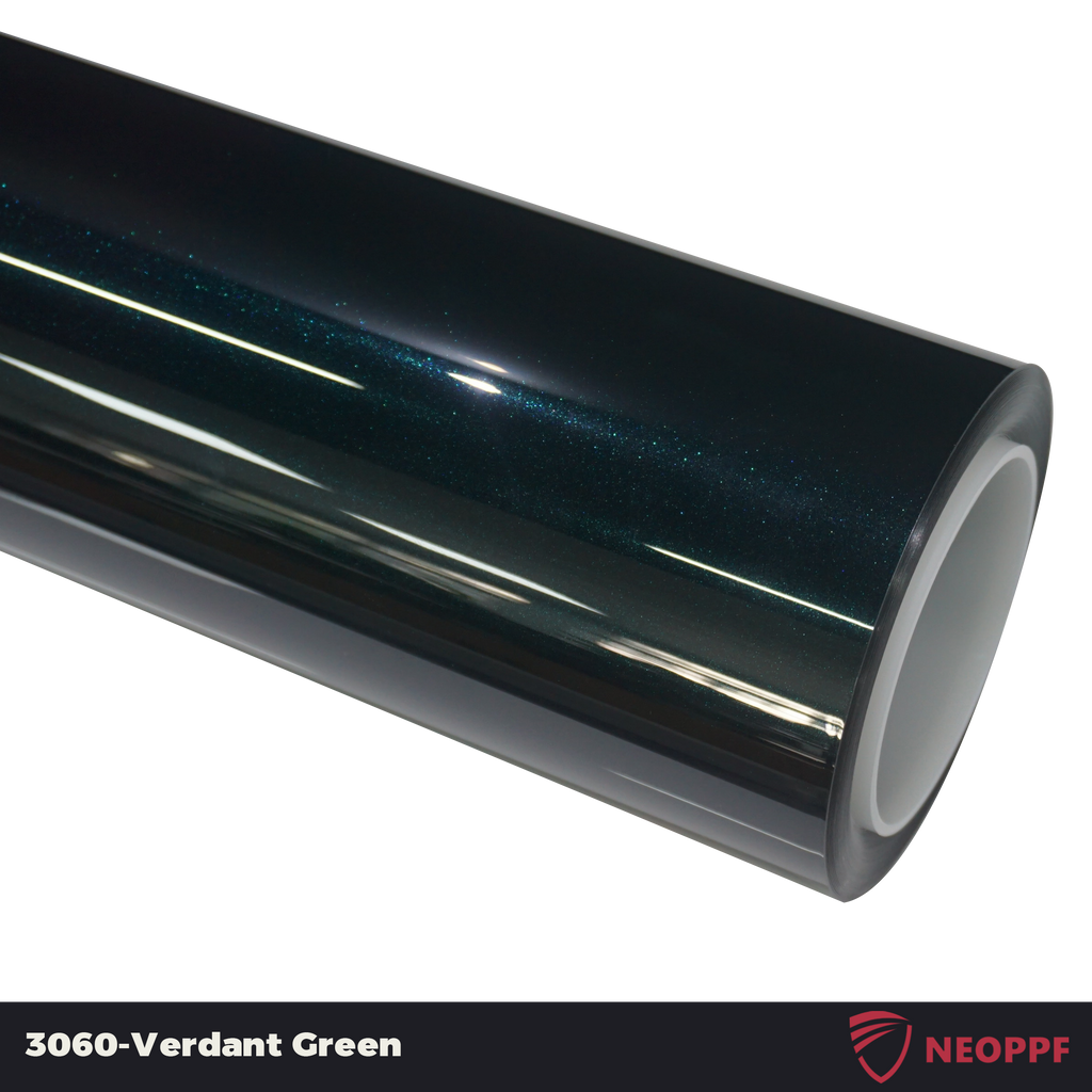A sports car with Verdant Green paint protection film colored wrap is parking in the garage