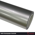 A sports car with Champagne Gold paint protection film colored wrap is parking in the garage