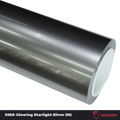A sports car with Glowing Starlight Silver paint protection film colored wrap is parking in the garage