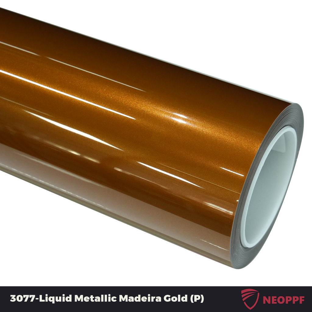 A sports car with Liquid Metallic Madeira Gold paint protection film colored wrap is parking in the garage