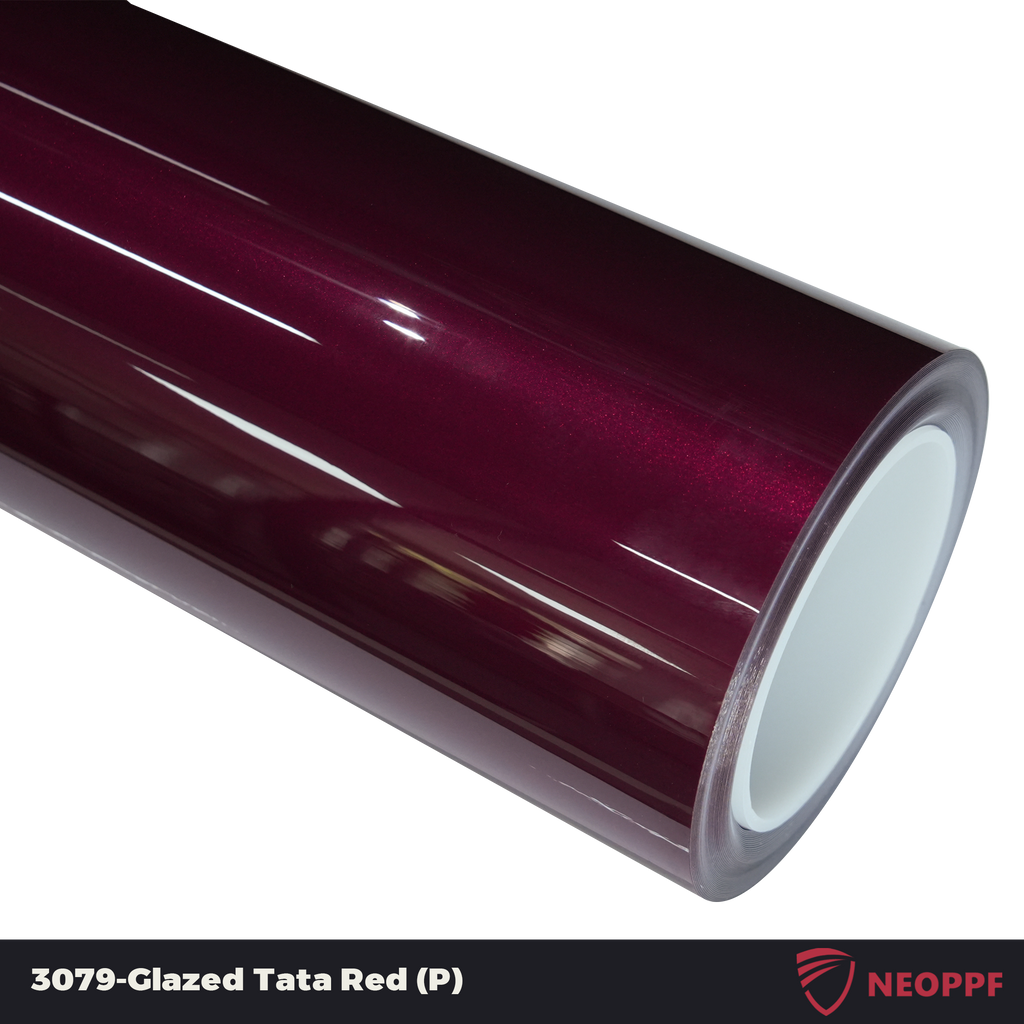 A sports car with Glazed Tata Red paint protection film colored wrap is parking in the garage