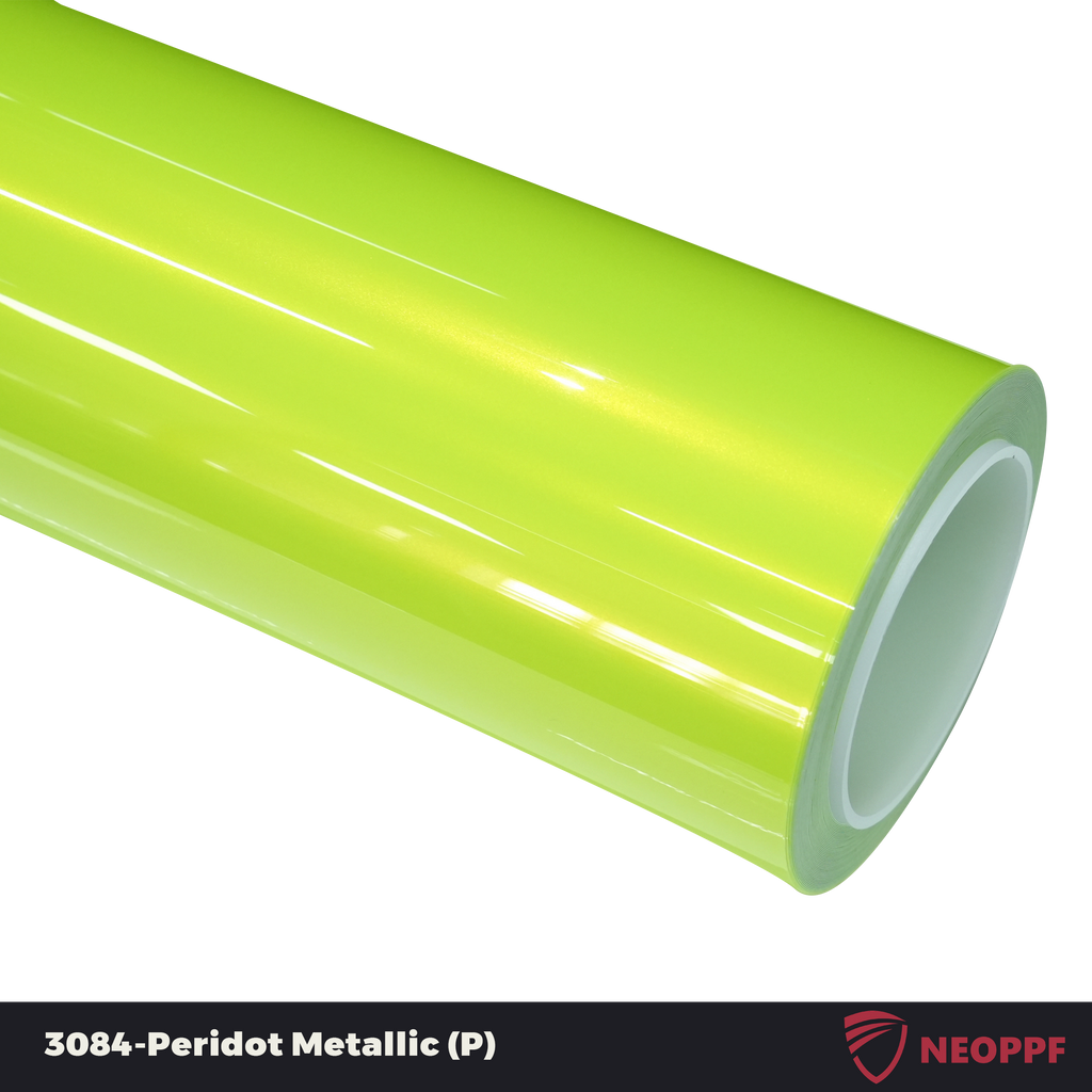 A sports car with Peridot Metallic paint protection film colored wrap is parking in the garage