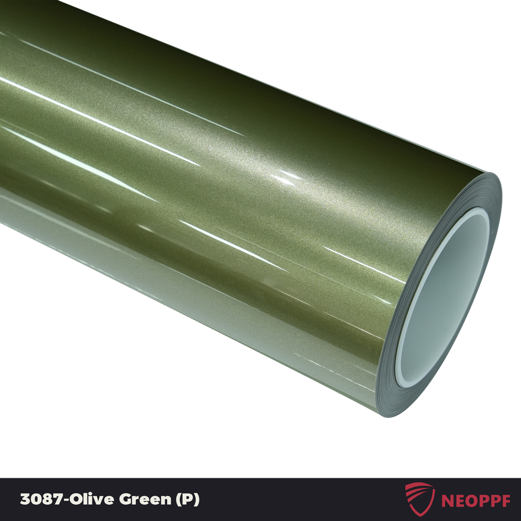 A sports car with Olive Green paint protection film colored wrap is parking in the garage