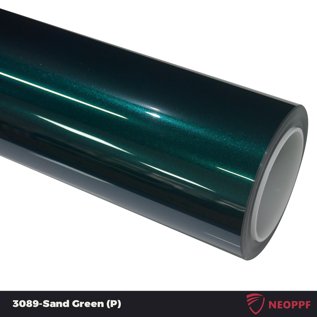 A sports car with Sand Green paint protection film colored wrap is parking in the garage