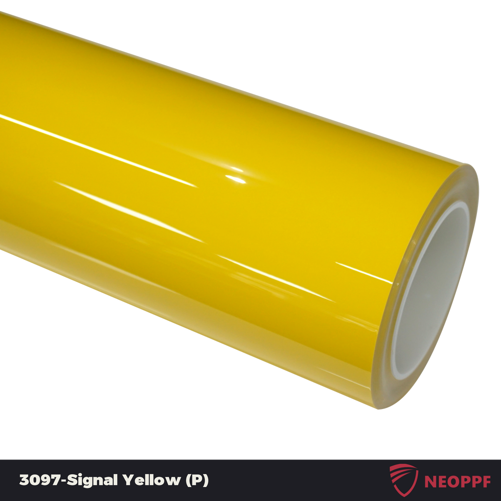 A sports car with Signal Yellow paint protection film colored wrap is parking in the garage
