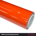 A sports car with Crystal Orange Red paint protection film colored wrap is parking in the garage