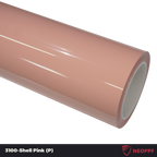 A sports car with Shell Pink paint protection film colored wrap is parking in the garage