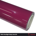 A sports car with Starlight Ruby Red paint protection film colored wrap is parking in the garage
