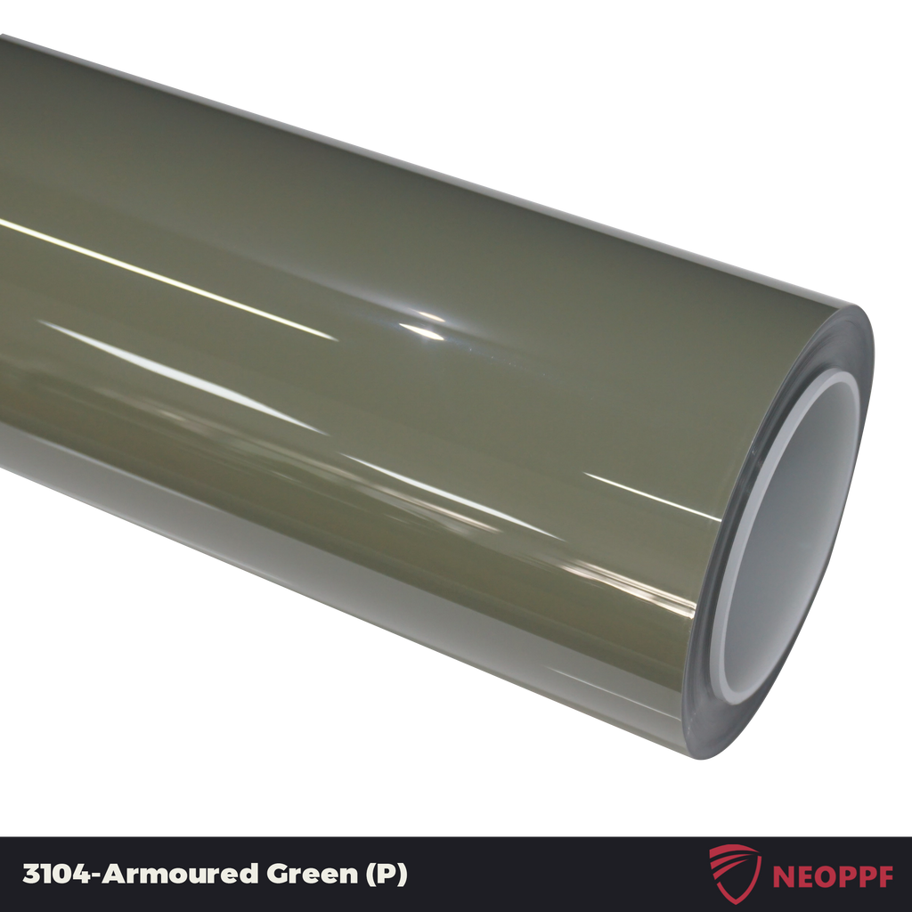 A sports car with Armoured Green paint protection film colored wrap is parking in the garage