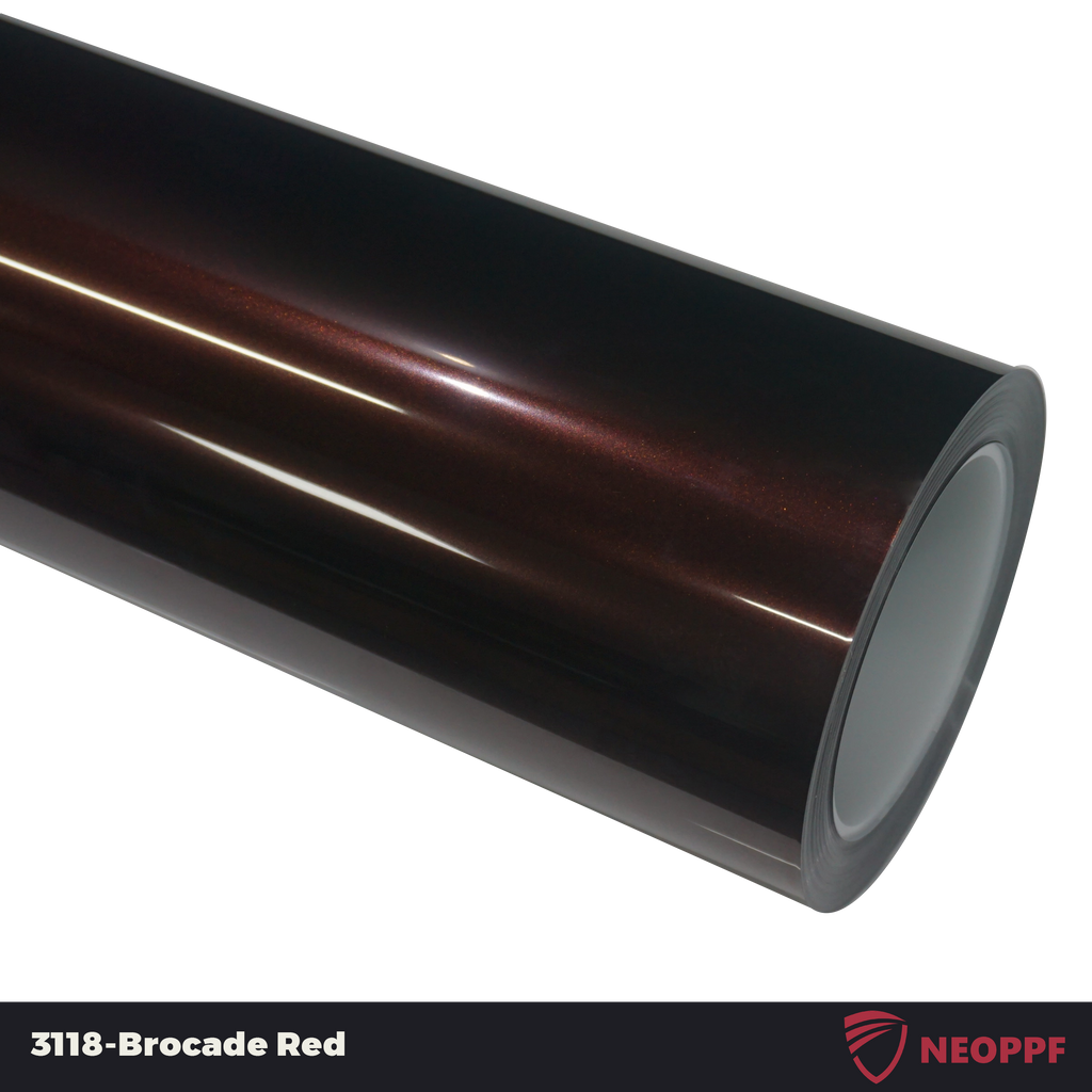 A sports car with Brocade Red paint protection film colored wrap is parking in the garage