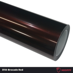 A sports car with Brocade Red paint protection film colored wrap is parking in the garage