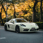 A sports car with Agate Gray paint protection film colored wrap is parking in the garage