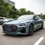 A sports car with Eucalyptus Blue paint protection film colored wrap is parking in the garage