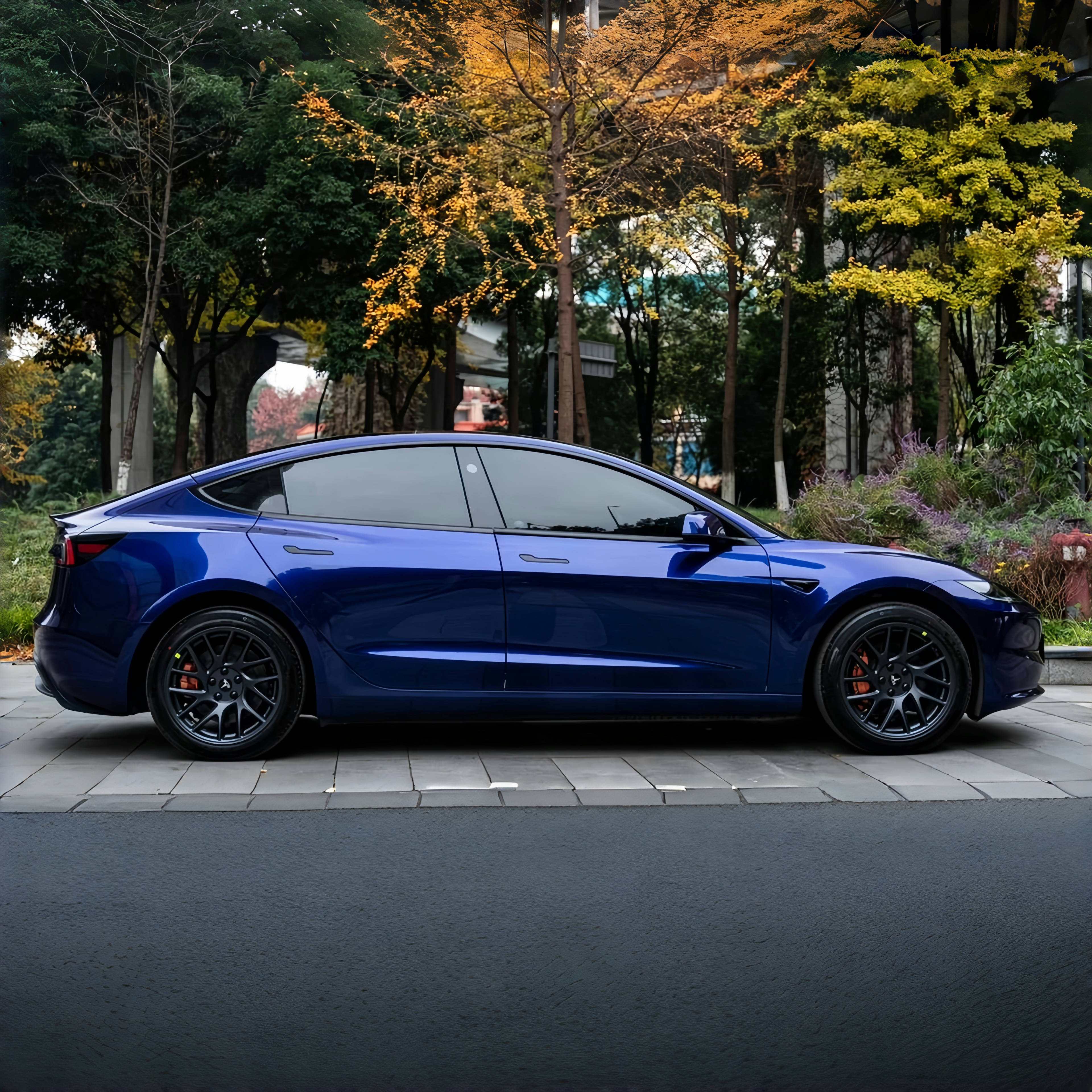 A sports car with Cobalt Blue Metallic paint protection film colored wrap is parking in the garage
