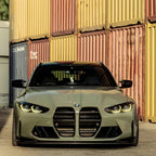 A sports car with Armoured Green paint protection film colored wrap is parking in the garage