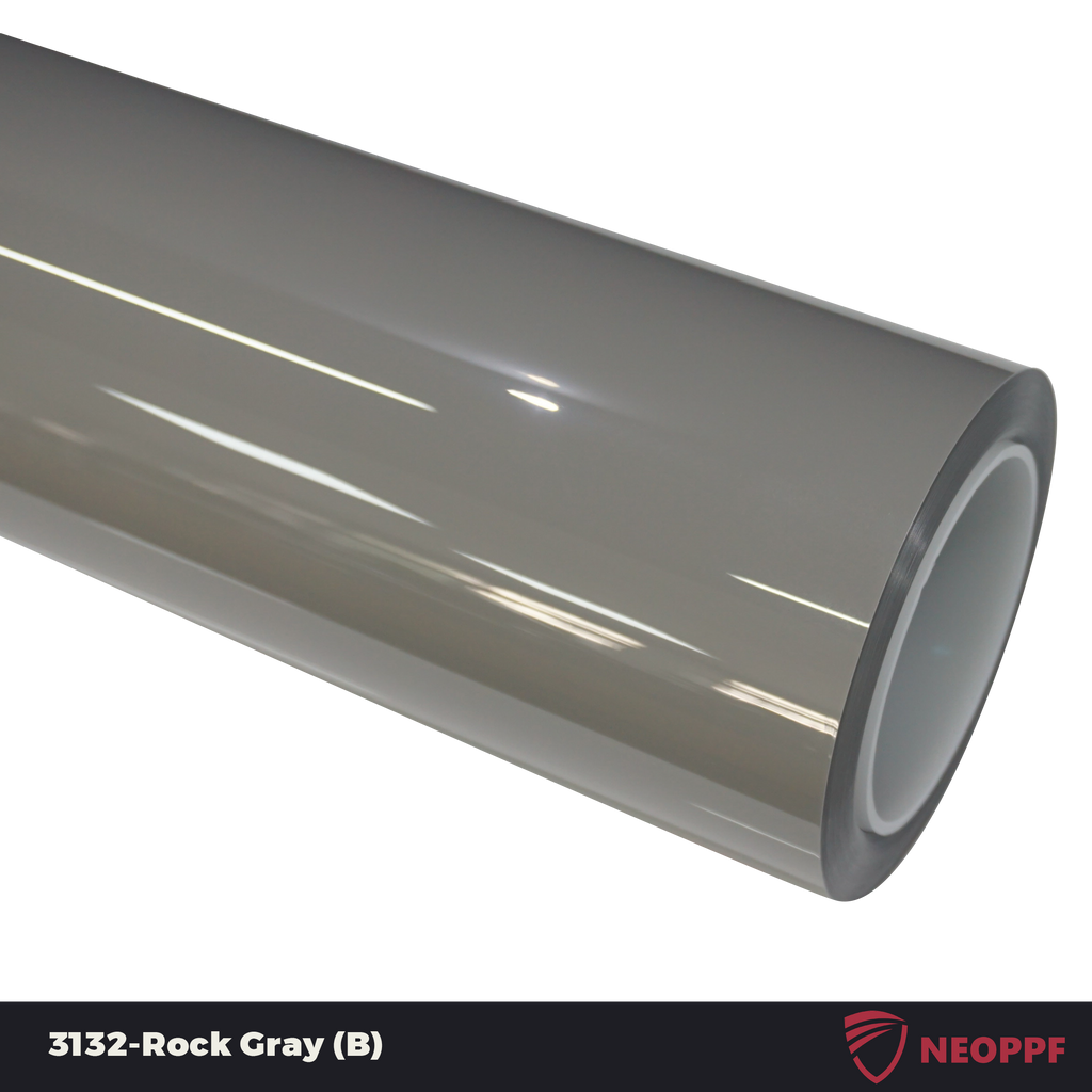 A sports car with Rock Gray paint protection film colored wrap is parking in the garage