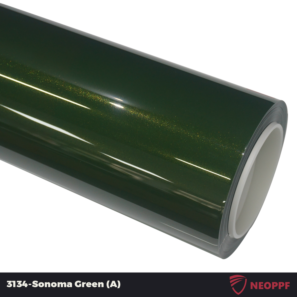 A sports car with Sonoma Green paint protection film colored wrap is parking in the garage