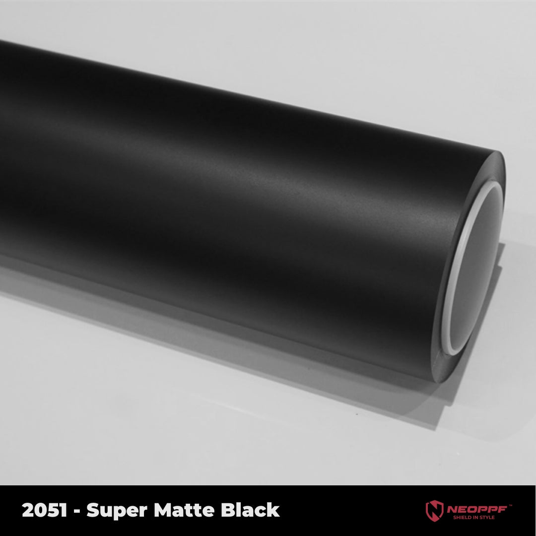 A sports car with Super Matte Black paint protection film colored wrap is parking in the garage