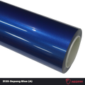 A sports car with Sepang Blue paint protection film colored wrap is parking in the garage