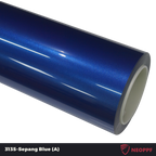 A sports car with Sepang Blue paint protection film colored wrap is parking in the garage