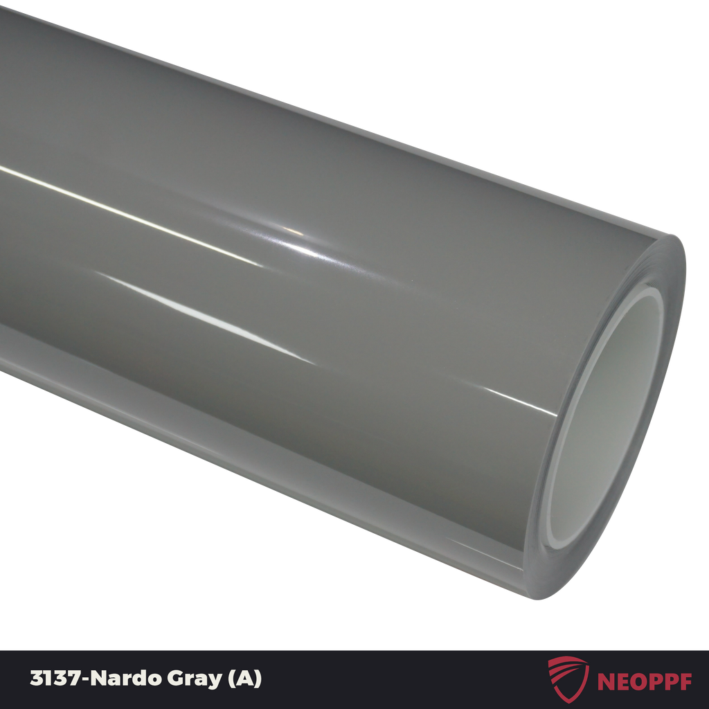 A sports car with Nardo Gray paint protection film colored wrap is parking in the garage