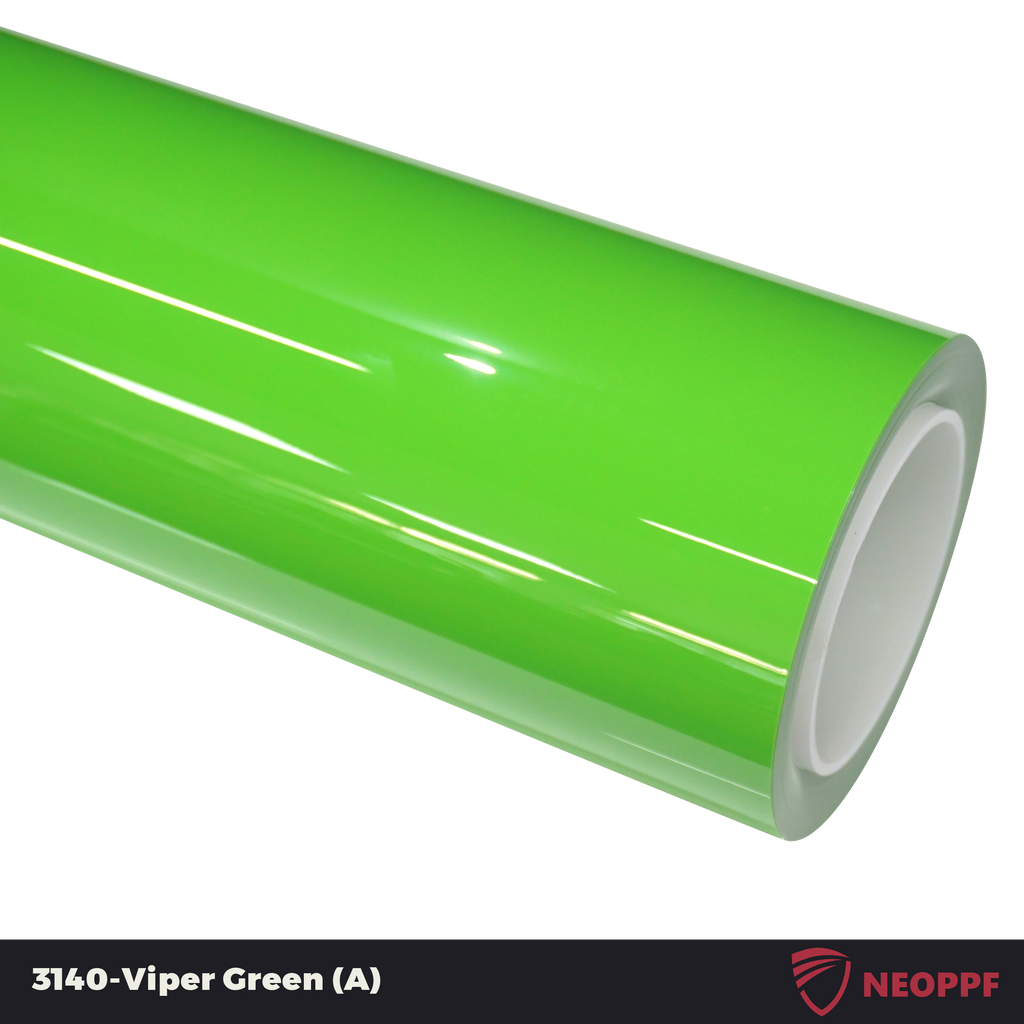 A sports car with Viper Green paint protection film colored wrap is parking in the garage