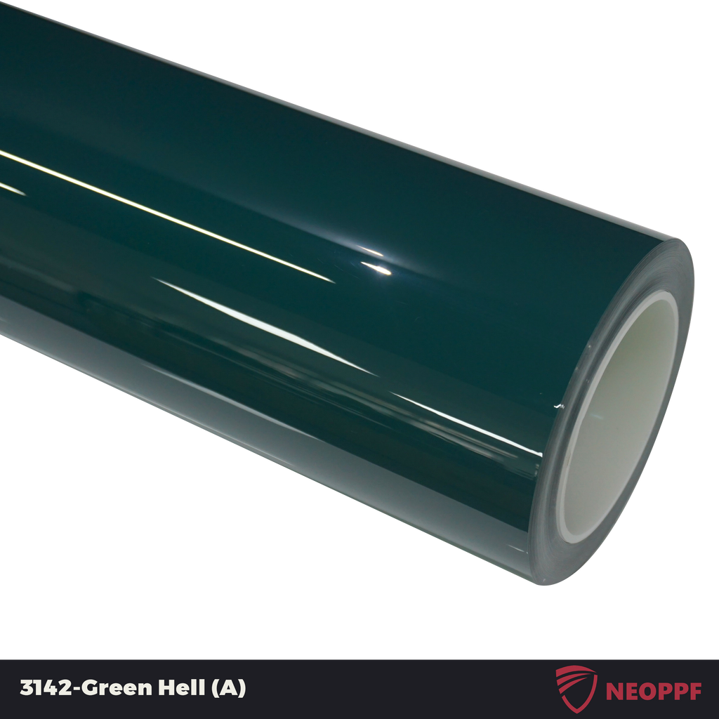A sports car with Green Hell paint protection film colored wrap is parking in the garage