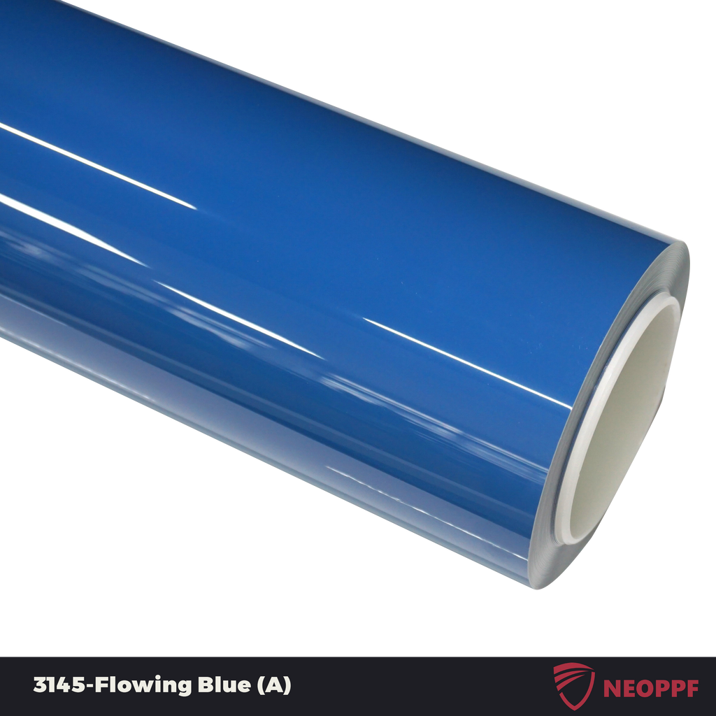 A sports car with Flowing Blue paint protection film colored wrap is parking in the garage