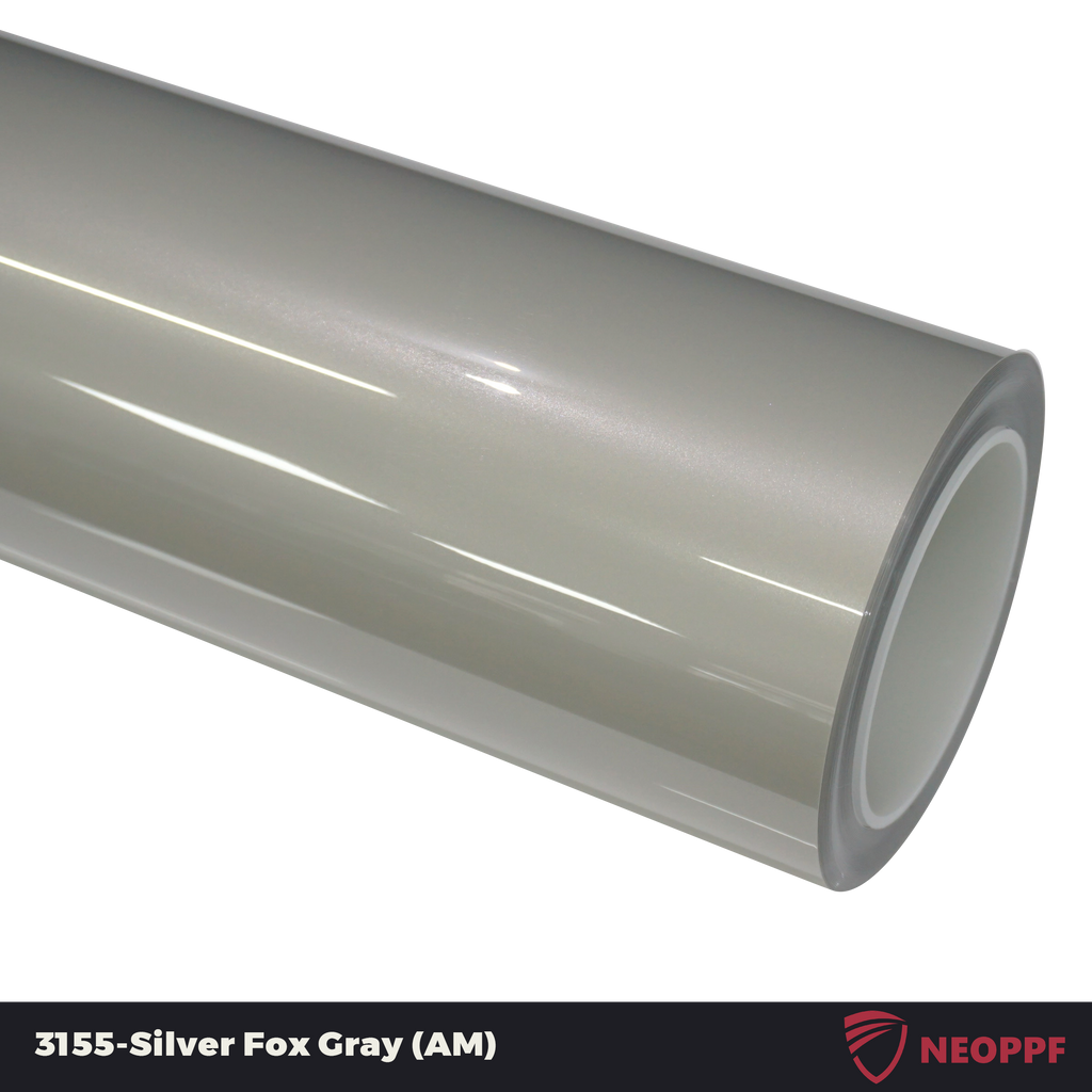 A sports car with Silver Fox Gray paint protection film colored wrap is parking in the garage