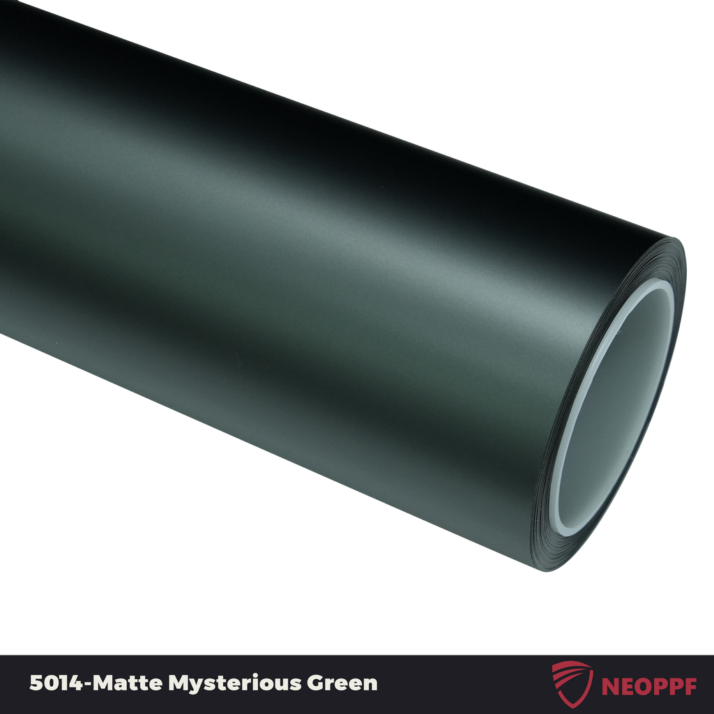 A sports car with Matte Mysterious Green paint protection film colored wrap is parking in the garage