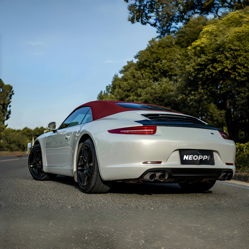A sports car with Silver Fox Gray paint protection film colored wrap is parking in the garage