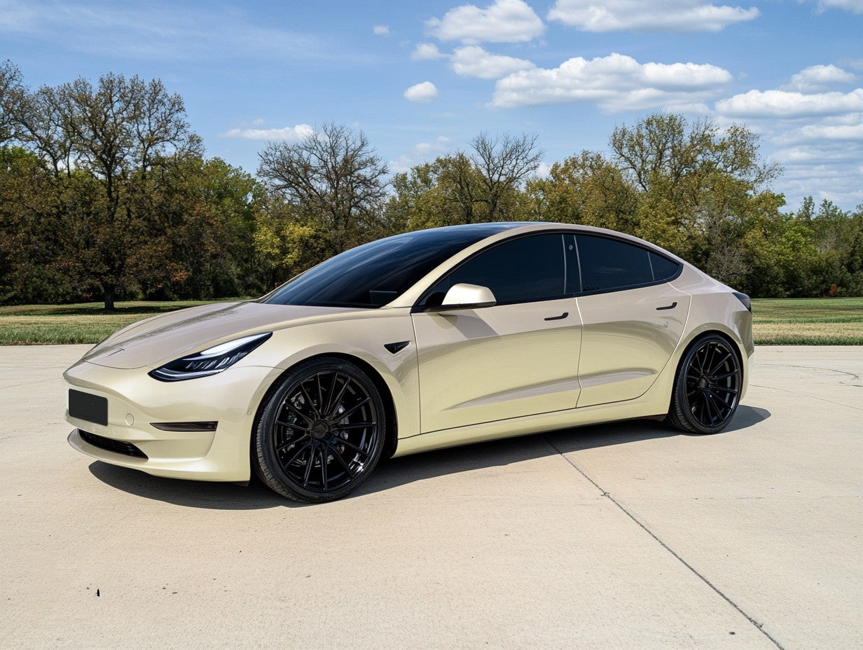 A sports car with Champagne Gold paint protection film colored wrap is parking in the garage