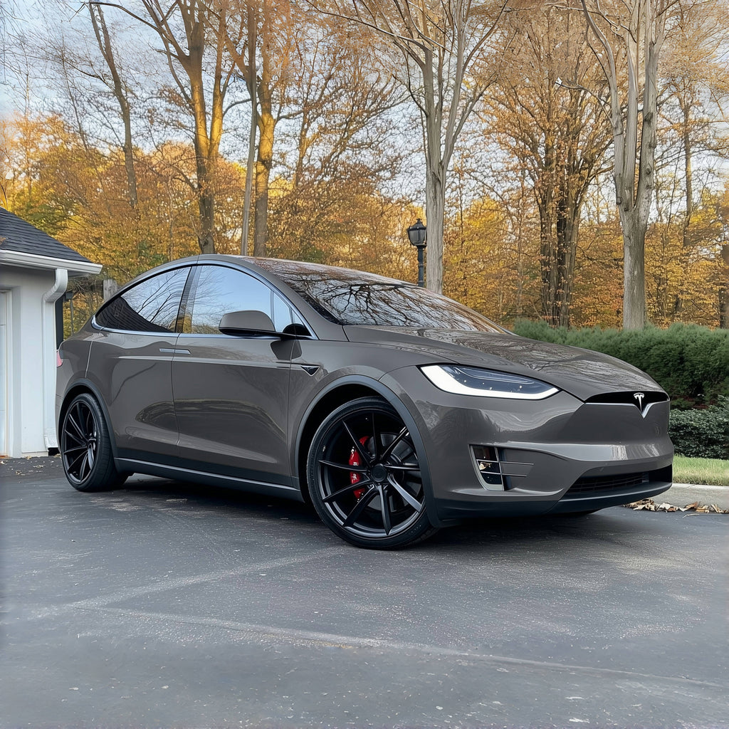 A sports car with Berina Gray paint protection film colored wrap is parking in the garage