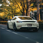 A sports car with Agate Gray paint protection film colored wrap is parking in the garage