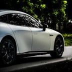 A sports car with Matte Blue Charm Gold paint protection film colored wrap is parking in the garage