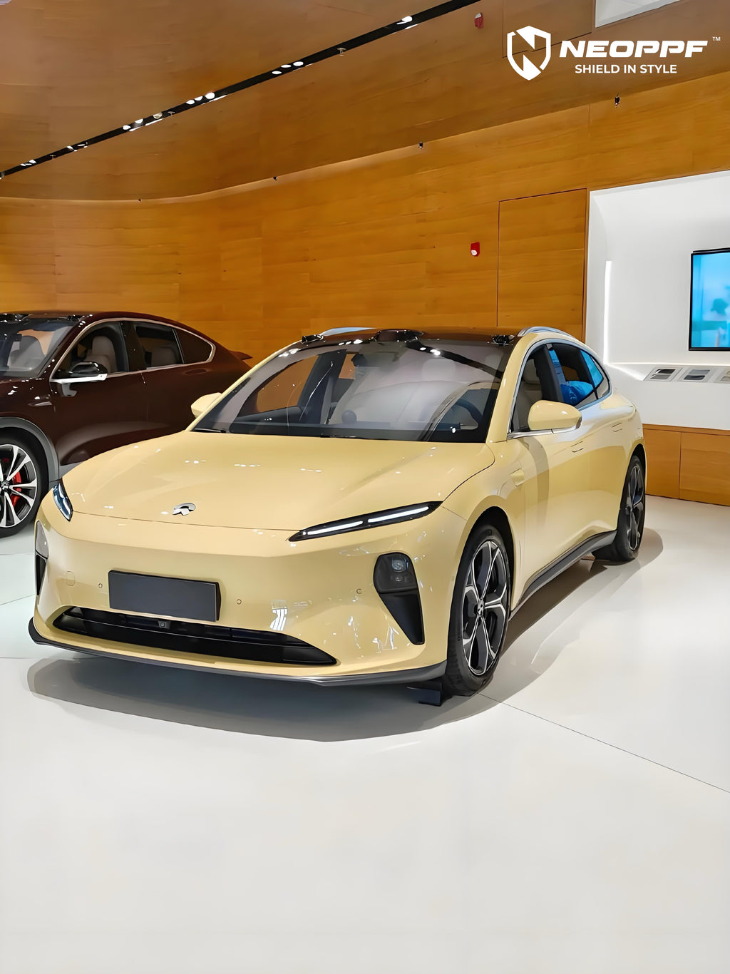 A sports car with Cream Yellow paint protection film colored wrap is parking in the garage