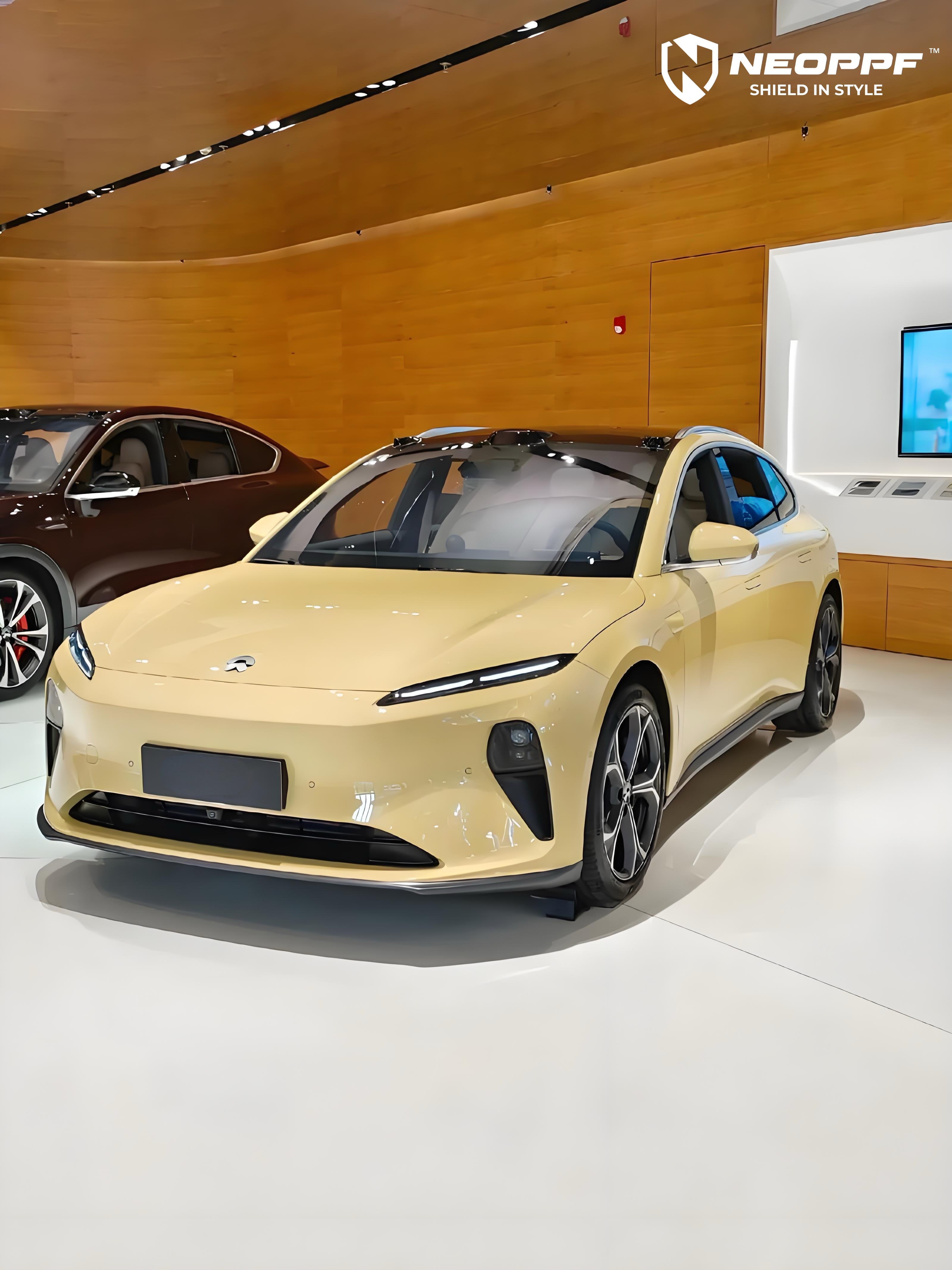 A sports car with Cream Yellow paint protection film colored wrap is parking in the garage